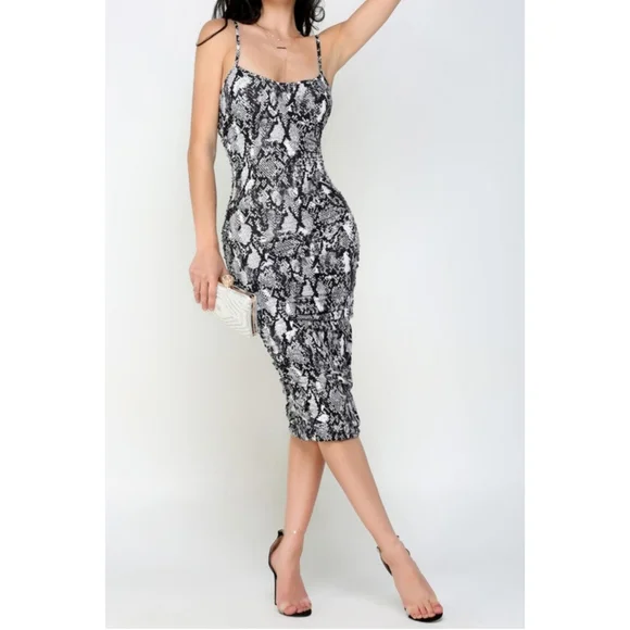 snake print ruched dress Stylish Snake Print Deep Plunge Long Sleeve Ruched Mini Dress for a Ch Canary Houze